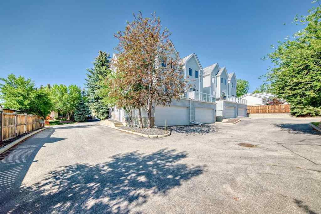 MLS® A2232962 - 12 Stradwick Rise SW in Strathcona Park Calgary, Residential