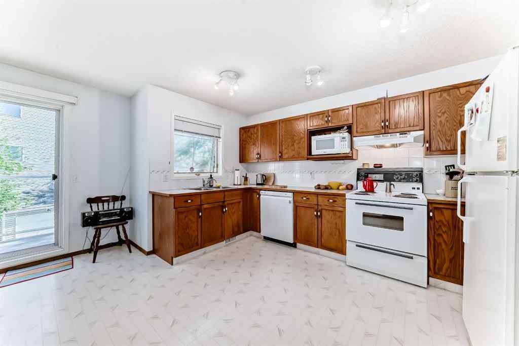 MLS® A2232962 - 12 Stradwick Rise SW in Strathcona Park Calgary, Residential
