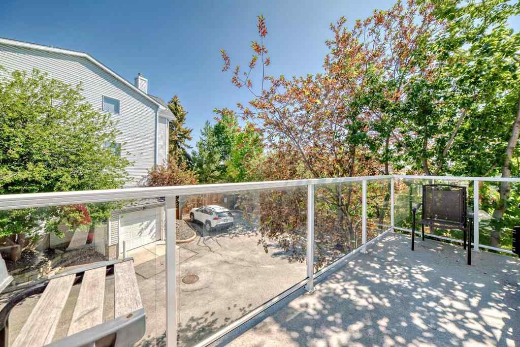 MLS® A2232962 - 12 Stradwick Rise SW in Strathcona Park Calgary, Residential
