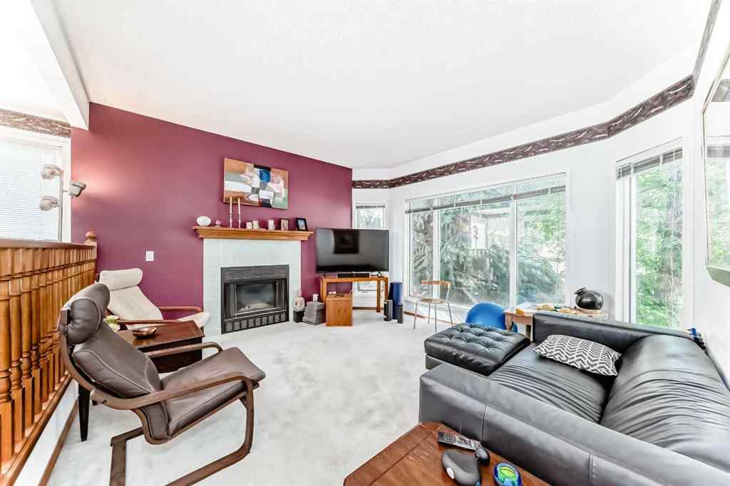 MLS® A2232962 - 12 Stradwick Rise SW in Strathcona Park Calgary, Residential