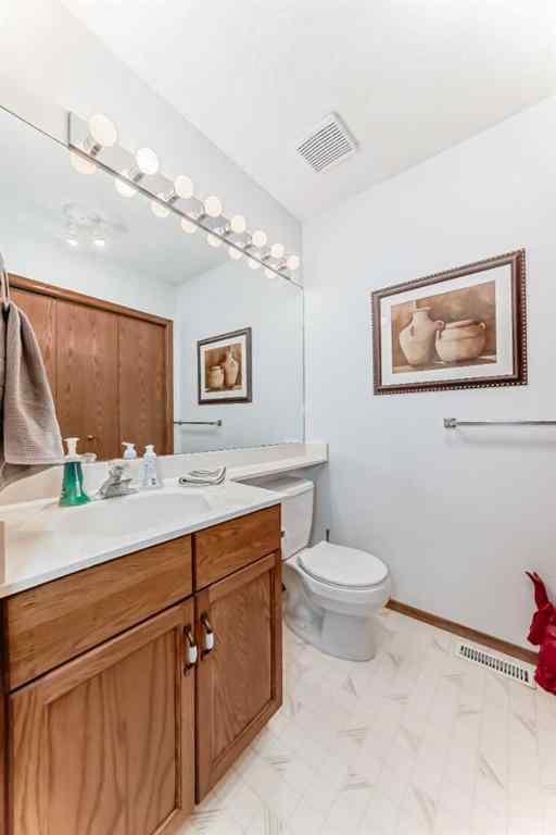 MLS® A2232962 - 12 Stradwick Rise SW in Strathcona Park Calgary, Residential