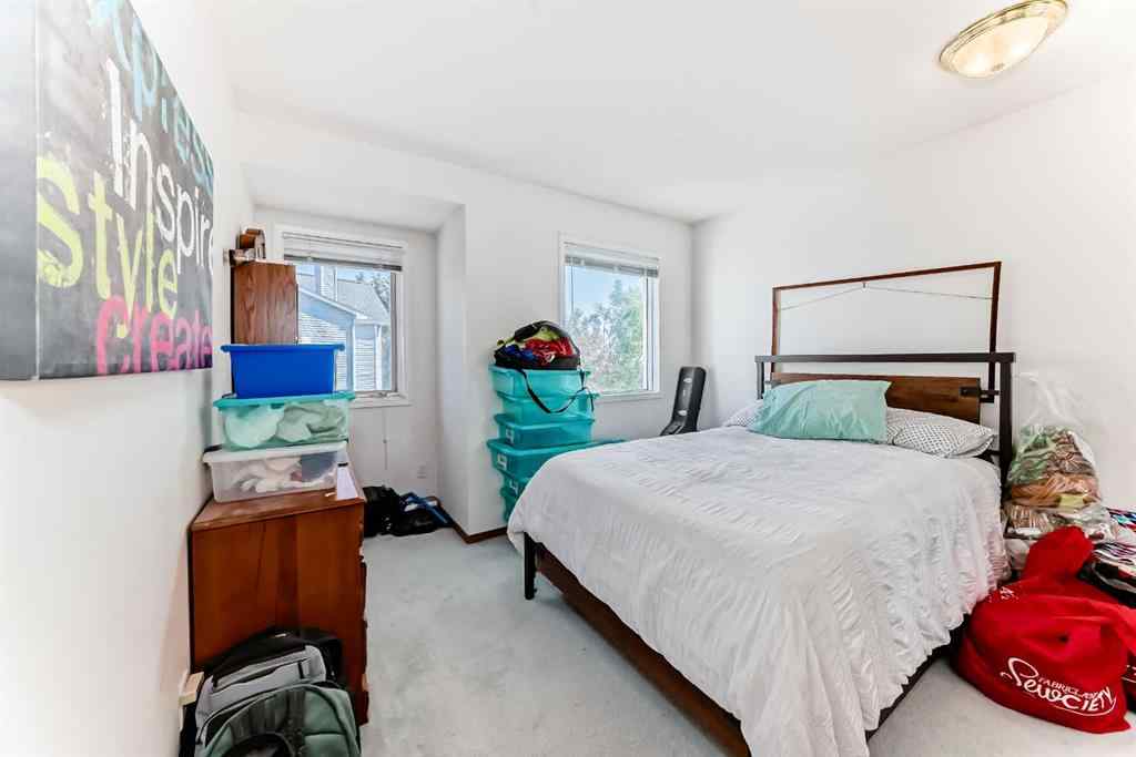 MLS® A2232962 - 12 Stradwick Rise SW in Strathcona Park Calgary, Residential
