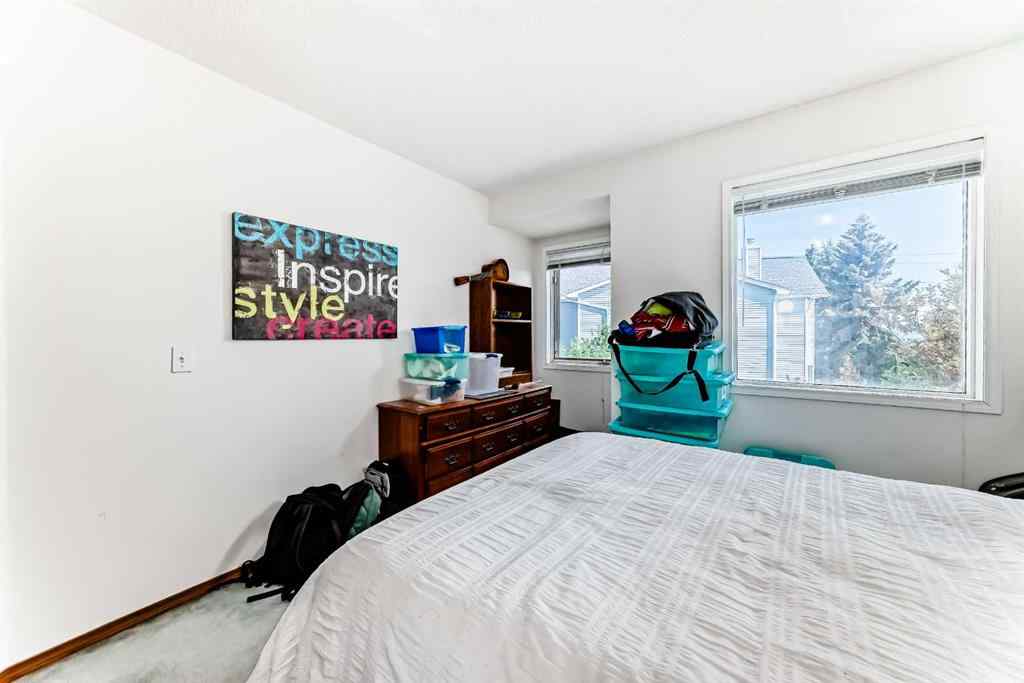 MLS® A2232962 - 12 Stradwick Rise SW in Strathcona Park Calgary, Residential