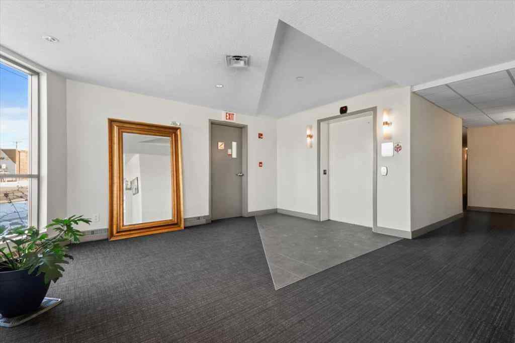 MLS® A2233012 - Unit #203 118 34 Street NW in Parkdale Calgary, Residential