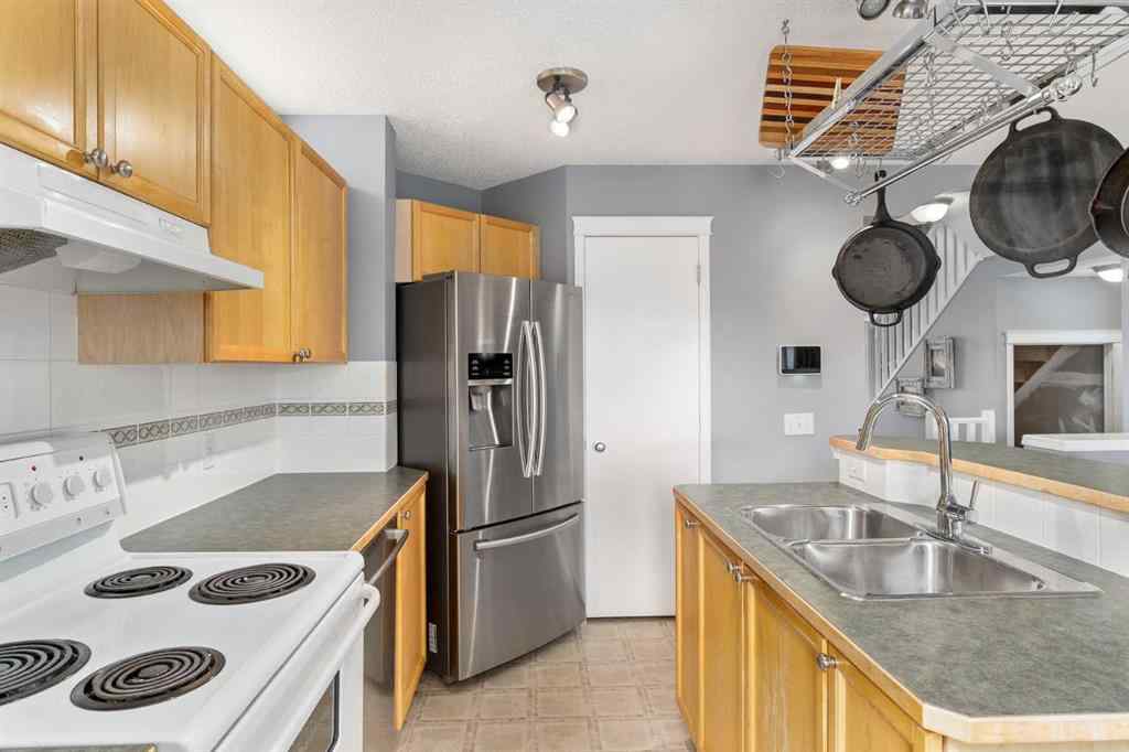MLS® A2233060 - 14 Tuscany Springs Rise NW in Tuscany Calgary, Residential