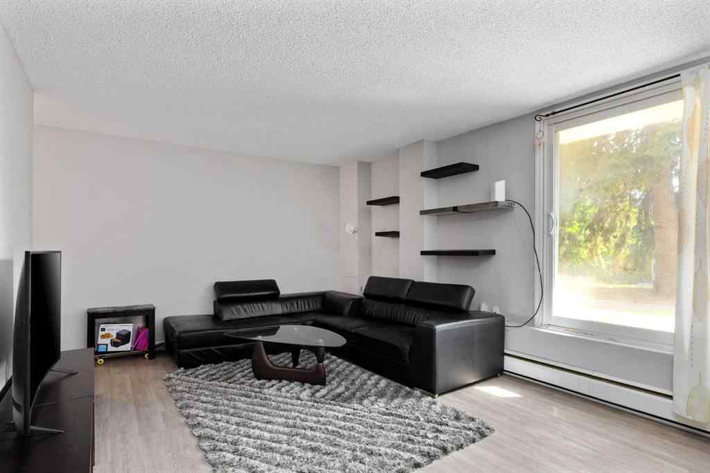 MLS® A2233091 - Unit #102 3518 44 Street SW in Glenbrook Calgary, Residential