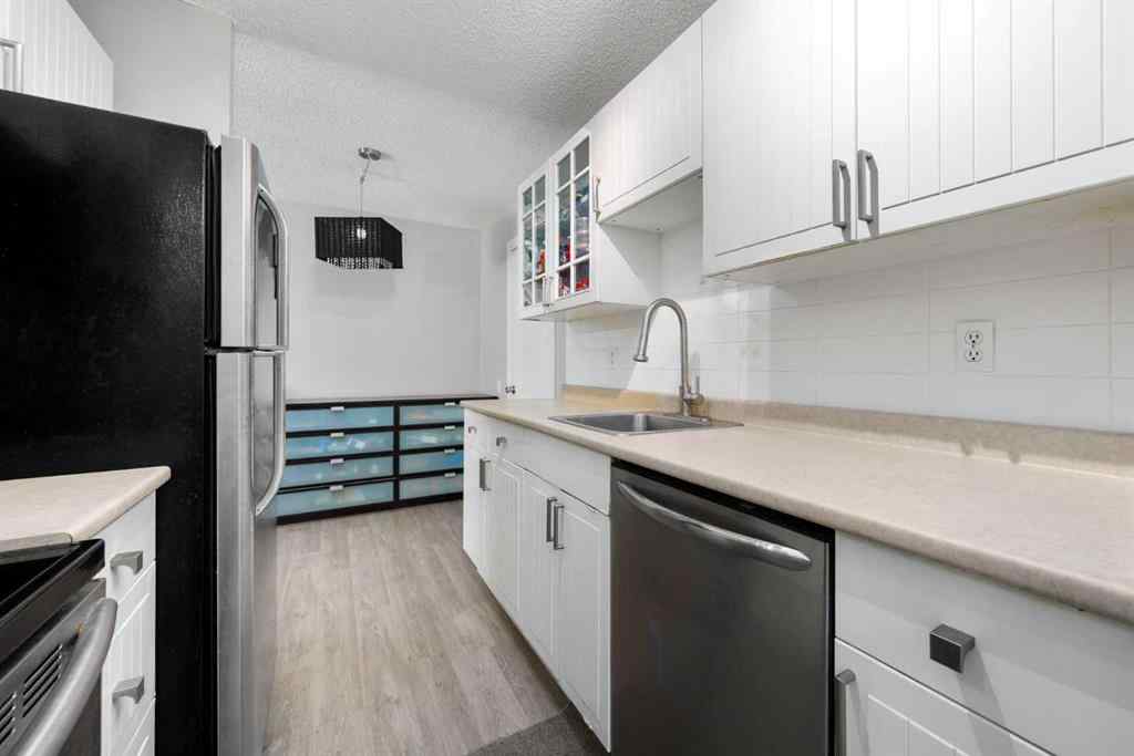 MLS® A2233091 - Unit #102 3518 44 Street SW in Glenbrook Calgary, Residential