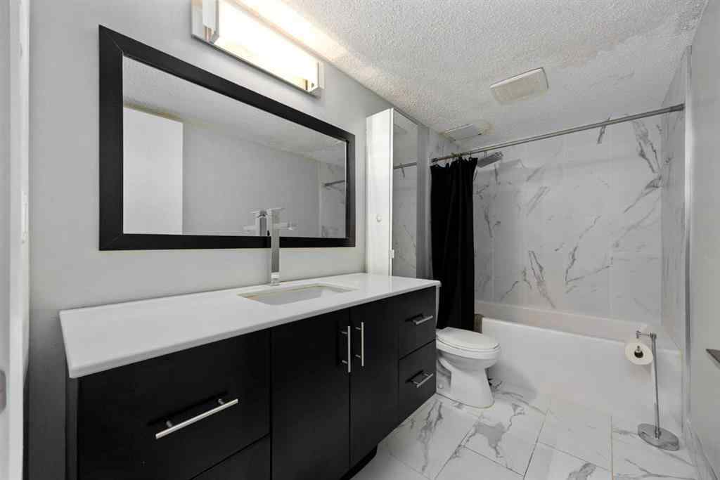 MLS® A2233091 - Unit #102 3518 44 Street SW in Glenbrook Calgary, Residential