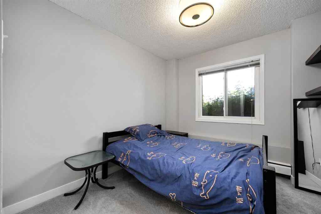 MLS® A2233091 - Unit #102 3518 44 Street SW in Glenbrook Calgary, Residential
