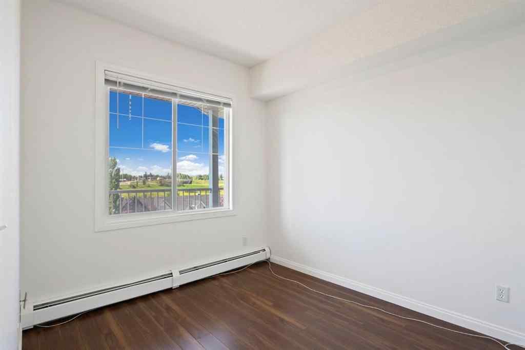 MLS® A2233147 - Unit #419 8 Prestwick Pond Terrace SE in McKenzie Towne Calgary, Residential