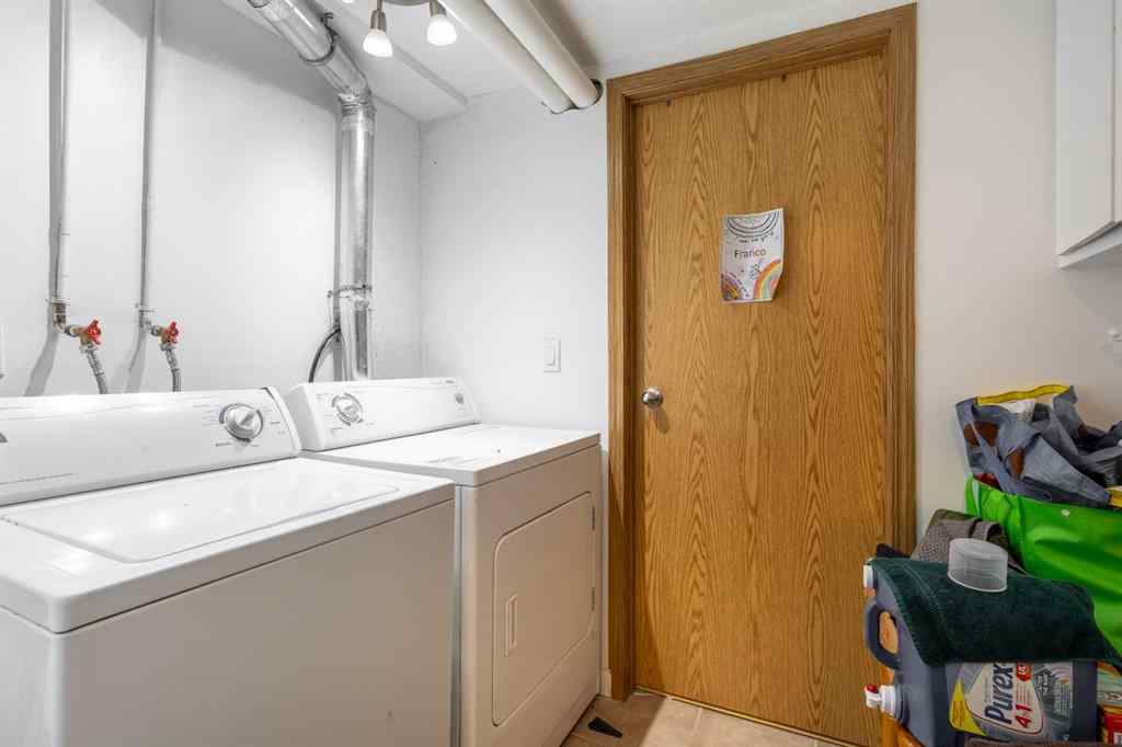 MLS® A2233167 - 703 130 Avenue SW in Canyon Meadows Calgary, Residential