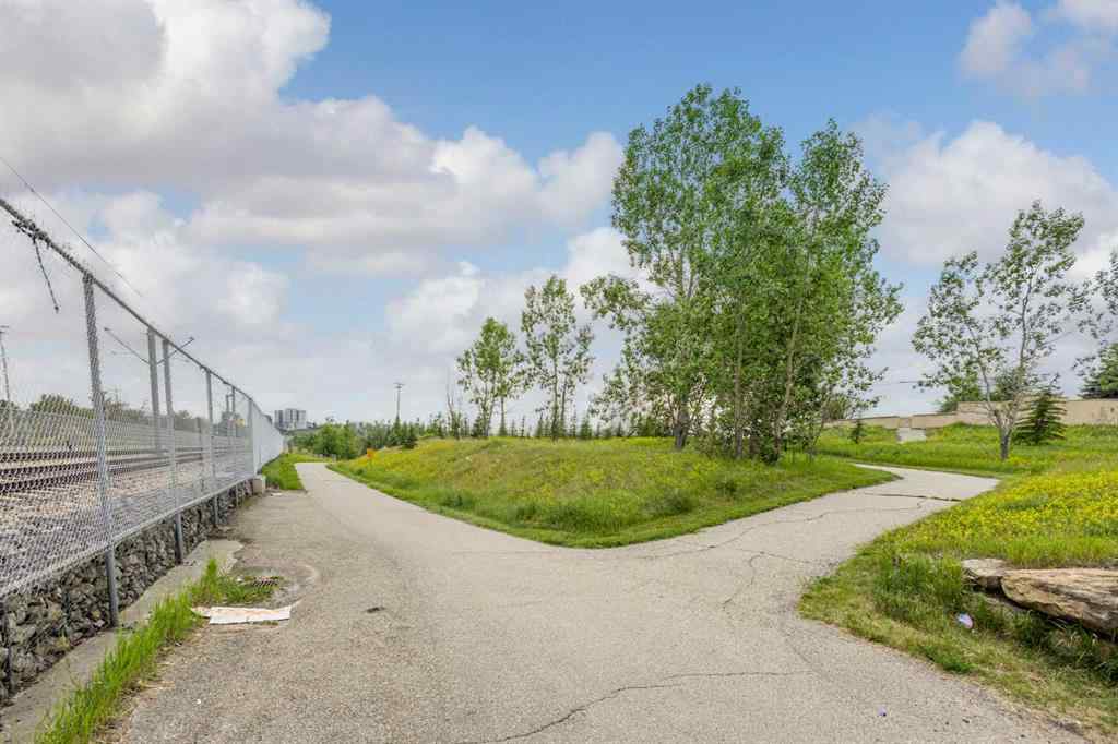 MLS® A2233167 - 703 130 Avenue SW in Canyon Meadows Calgary, Residential