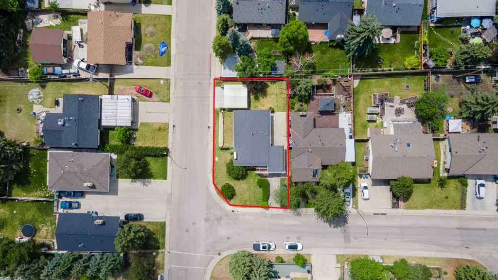 MLS® A2233167 - 703 130 Avenue SW in Canyon Meadows Calgary, Residential