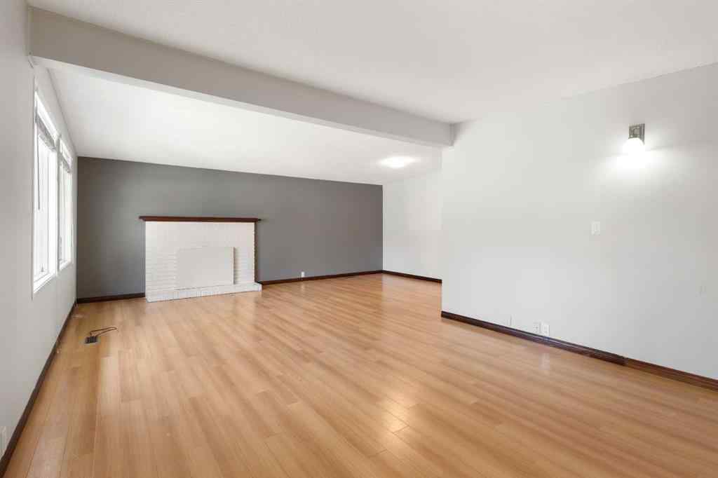 MLS® A2233167 - 703 130 Avenue SW in Canyon Meadows Calgary, Residential