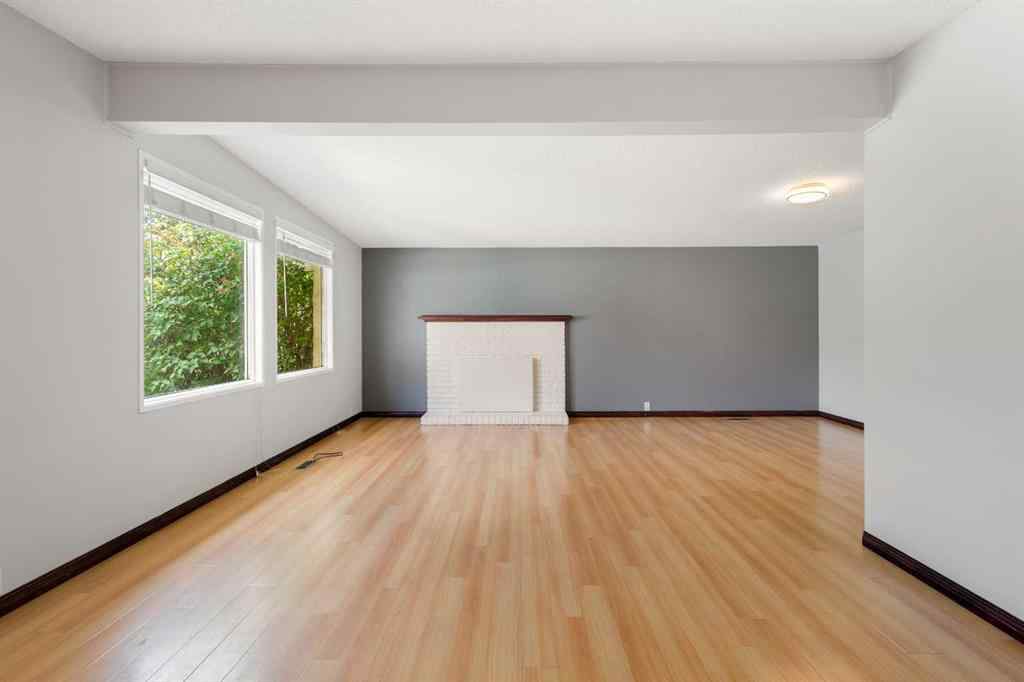 MLS® A2233167 - 703 130 Avenue SW in Canyon Meadows Calgary, Residential