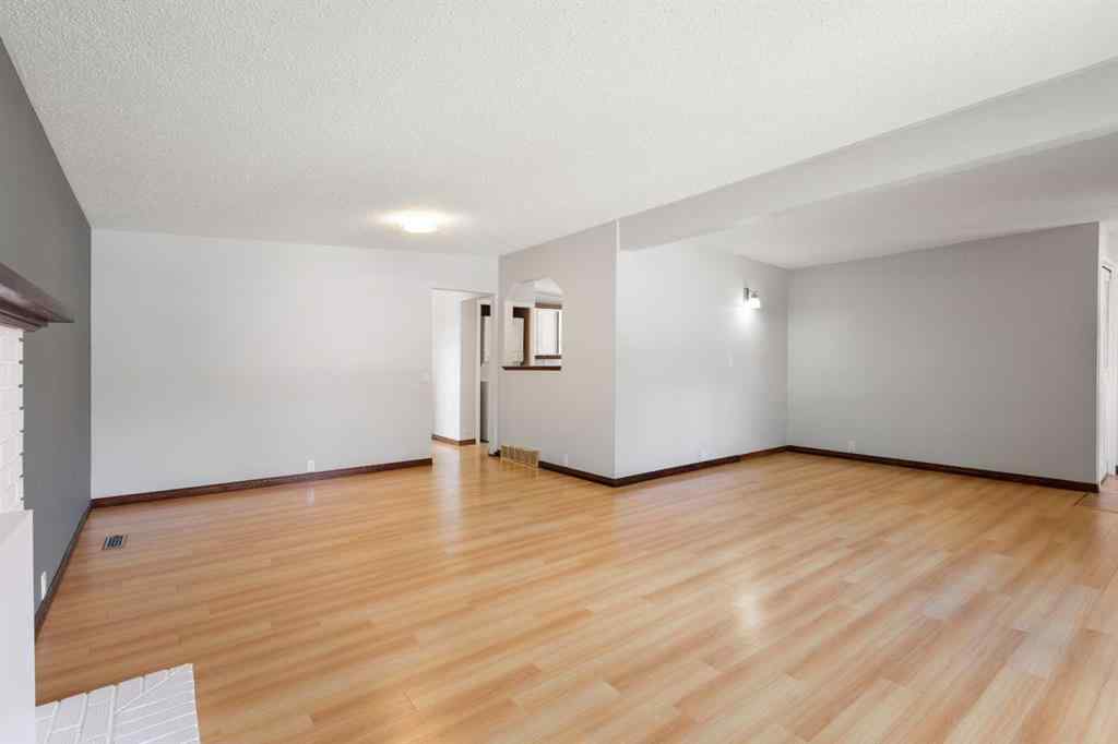 MLS® A2233167 - 703 130 Avenue SW in Canyon Meadows Calgary, Residential