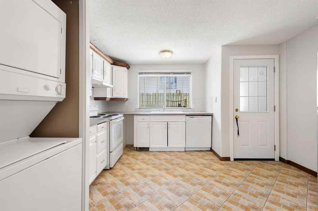 MLS® A2233167 - 703 130 Avenue SW in Canyon Meadows Calgary, Residential