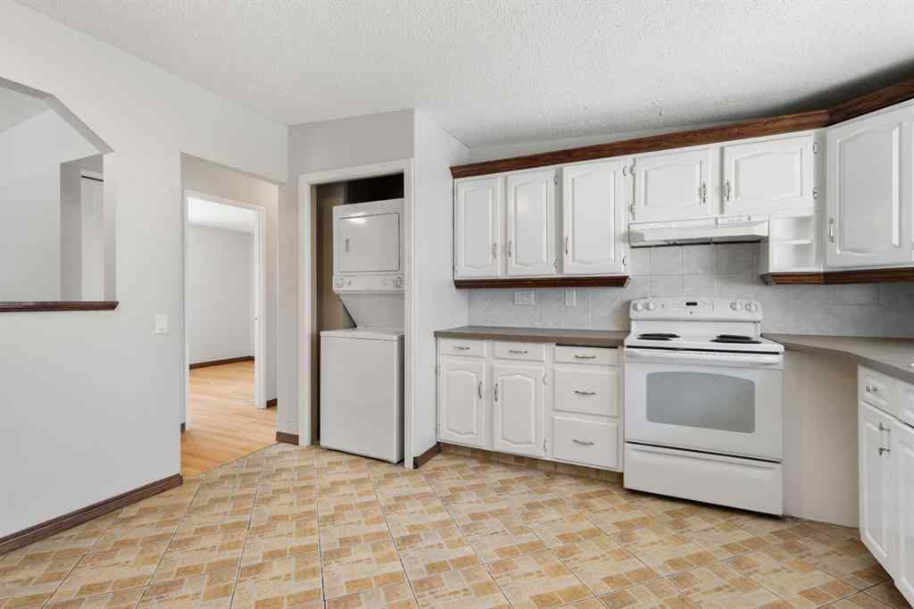 MLS® A2233167 - 703 130 Avenue SW in Canyon Meadows Calgary, Residential