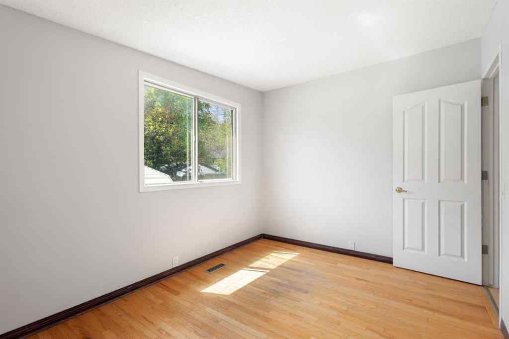 MLS® A2233167 - 703 130 Avenue SW in Canyon Meadows Calgary, Residential