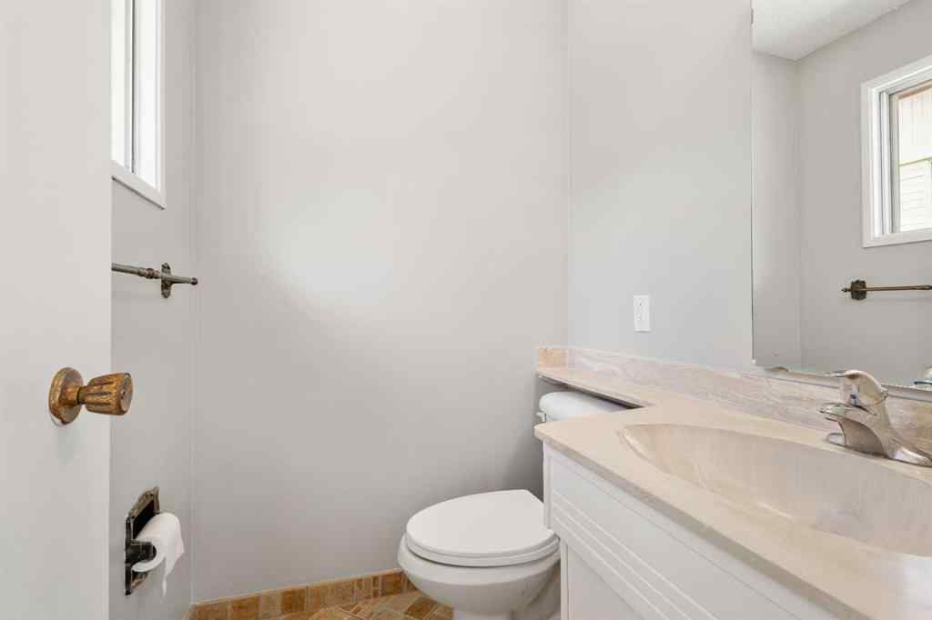 MLS® A2233167 - 703 130 Avenue SW in Canyon Meadows Calgary, Residential