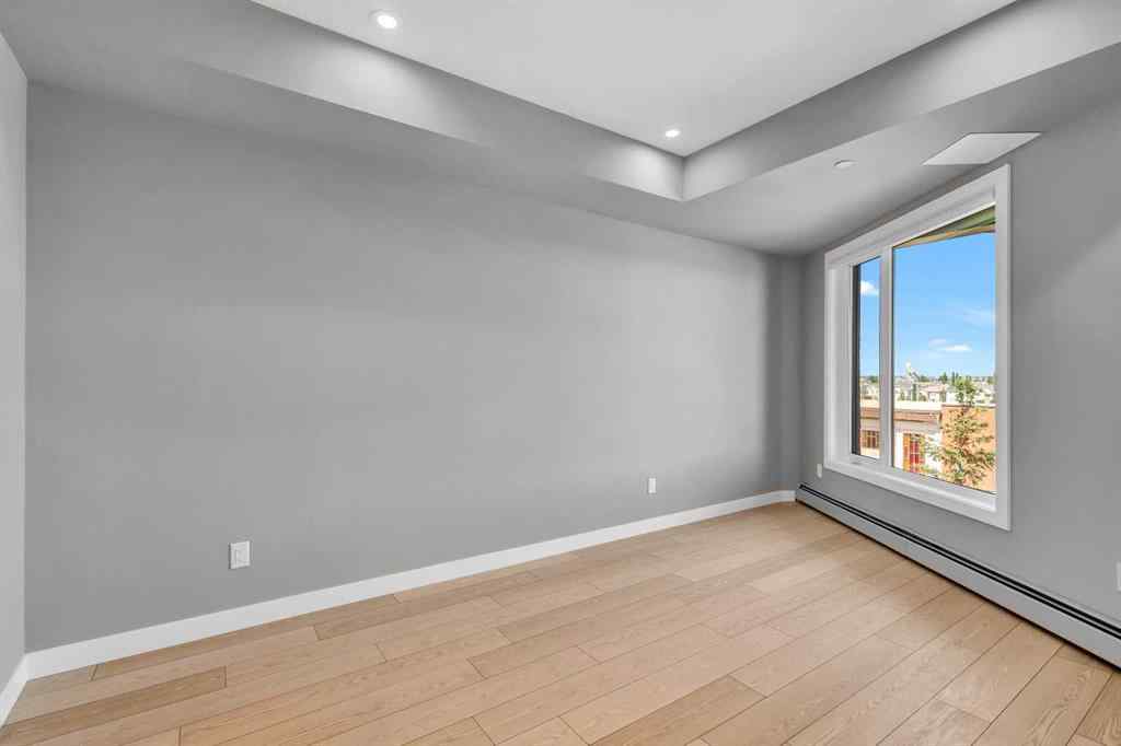 MLS® A2233220 - Unit #412 8230 Broadcast Avenue  in West Springs Calgary, Residential
