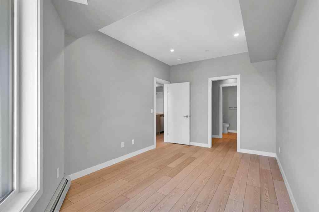 MLS® A2233220 - Unit #412 8230 Broadcast Avenue  in West Springs Calgary, Residential