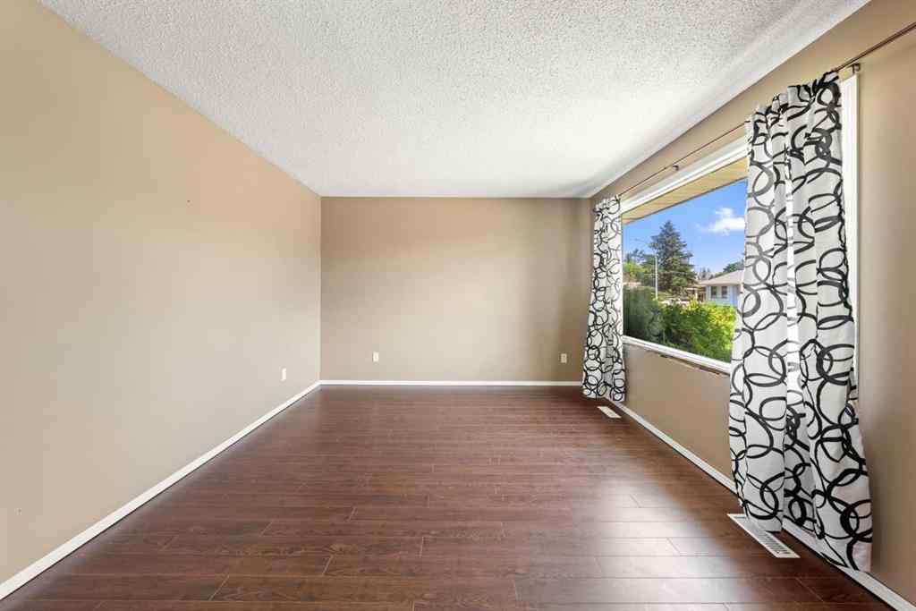 MLS® A2233397 - 40 Lake Bevan Drive E in Lakewood Brooks, Residential