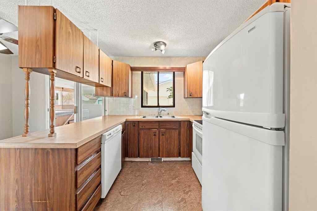 MLS® A2233397 - 40 Lake Bevan Drive E in Lakewood Brooks, Residential