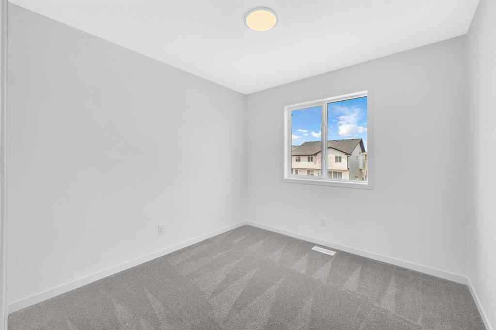 MLS® A2233479 - 32 Rowmont Common NW in Haskayne Calgary, Residential