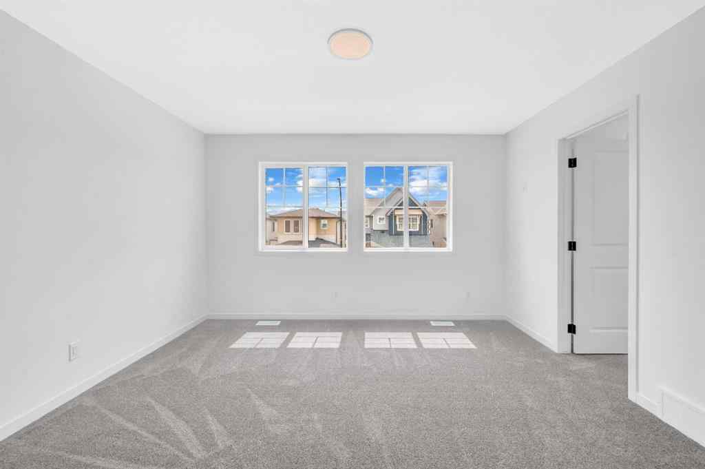 MLS® A2233479 - 32 Rowmont Common NW in Haskayne Calgary, Residential