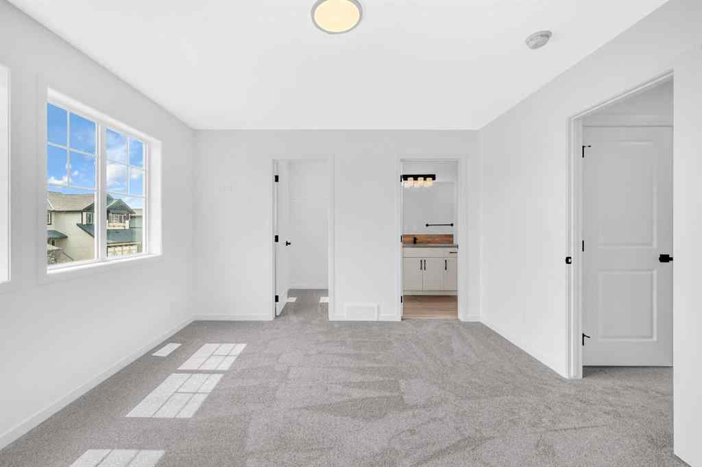 MLS® A2233479 - 32 Rowmont Common NW in Haskayne Calgary, Residential