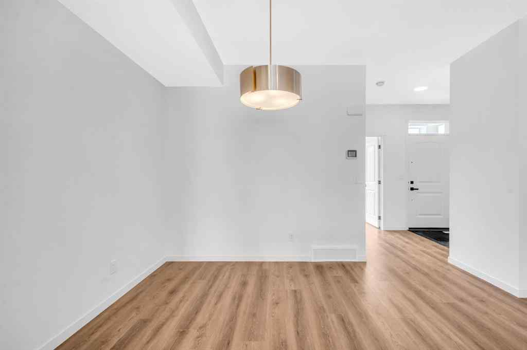 MLS® A2233479 - 32 Rowmont Common NW in Haskayne Calgary, Residential