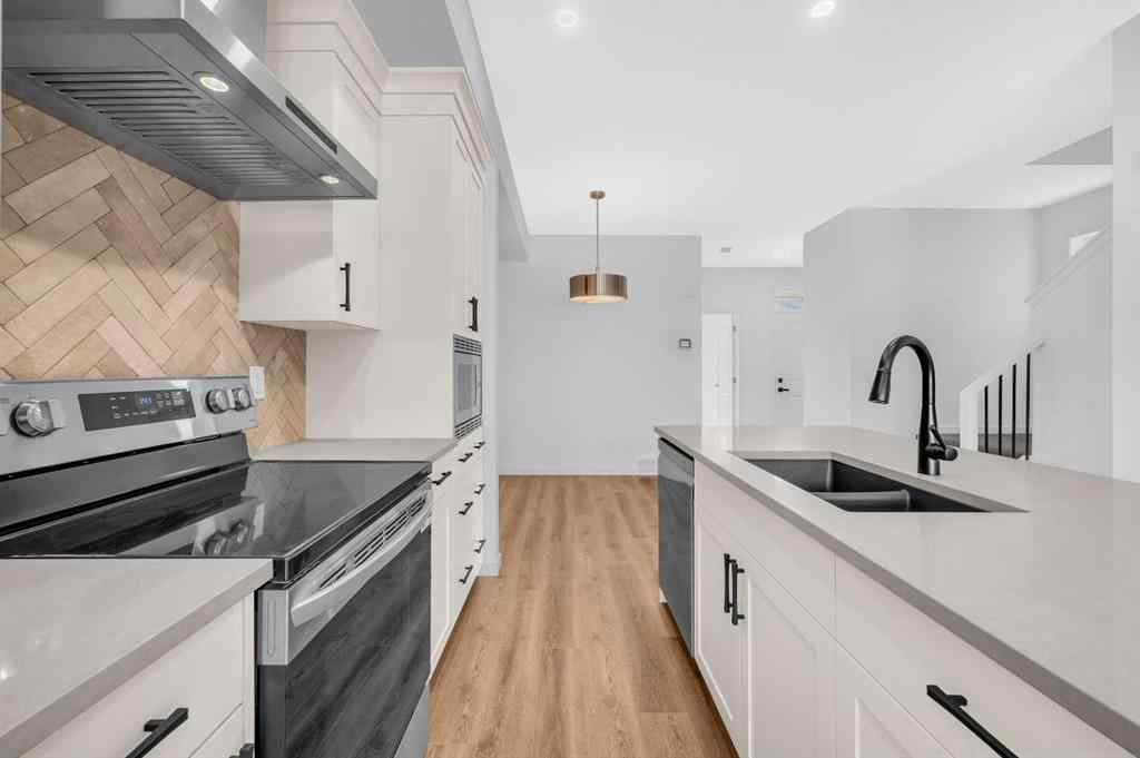 MLS® A2233479 - 32 Rowmont Common NW in Haskayne Calgary, Residential
