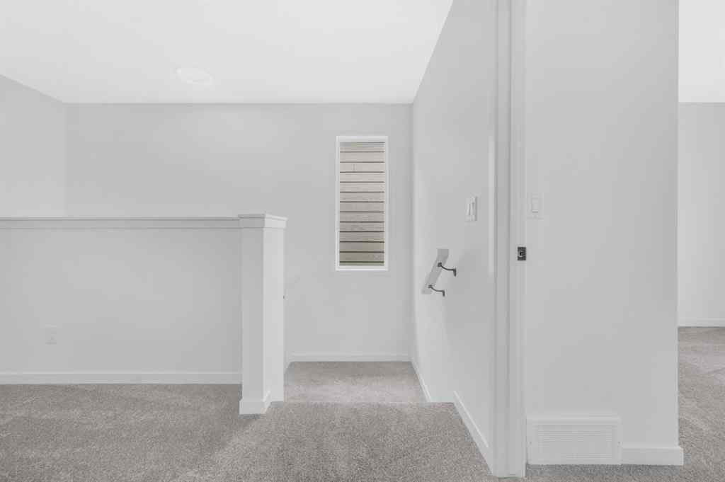 MLS® A2233479 - 32 Rowmont Common NW in Haskayne Calgary, Residential