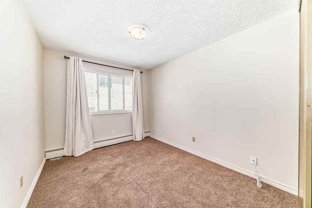 MLS® A2233510 - Unit #213 617 56 Avenue SW in Windsor Park Calgary, Residential