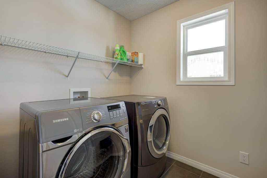 MLS® A2233514 - 129 Walden Crescent SE in Walden Calgary, Residential