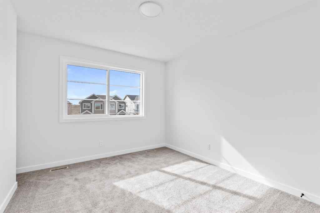 MLS® A2233519 - 437 Lewiston Landing NE in Lewisburg Calgary, Residential