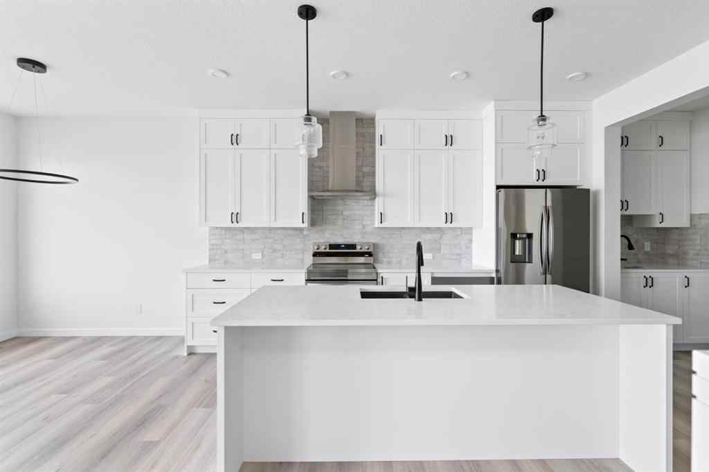 MLS® A2233519 - 437 Lewiston Landing NE in Lewisburg Calgary, Residential
