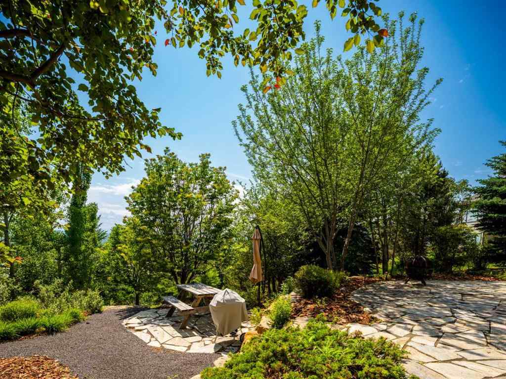 MLS® A2233548 - 57 Slopes Point SW in Springbank Hill Calgary, Residential