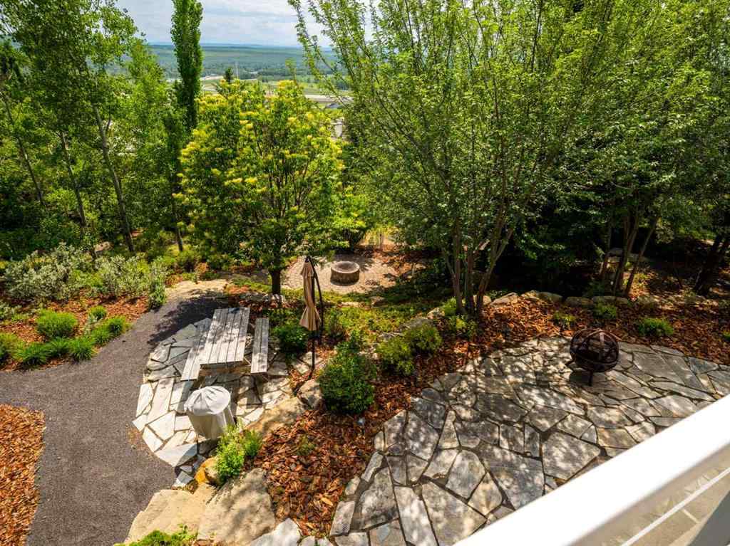 MLS® A2233548 - 57 Slopes Point SW in Springbank Hill Calgary, Residential