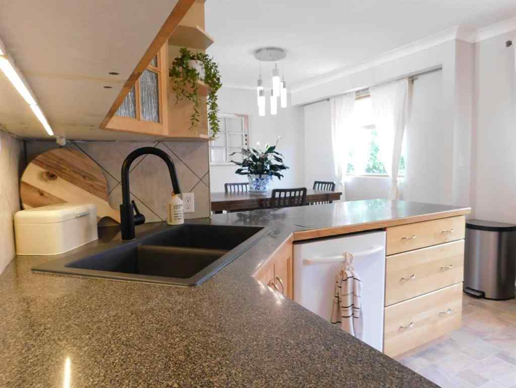 MLS® A2233755 - 315 6 Street W in West End Brooks, Residential