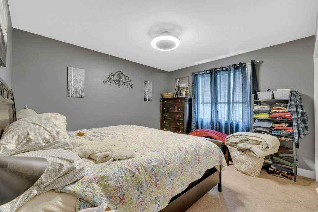 MLS® A2233783 - 4950 53 Avenue  in Napoleon Lake Innisfail, Residential