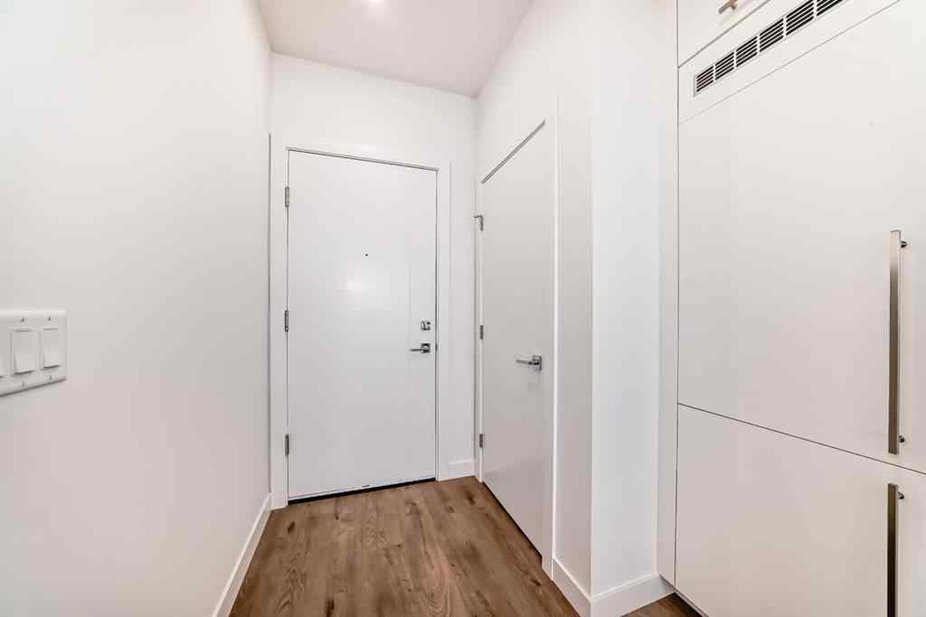 MLS® A2233786 - Unit #411 8230 Broadcast Avenue SW in West Springs Calgary, Residential