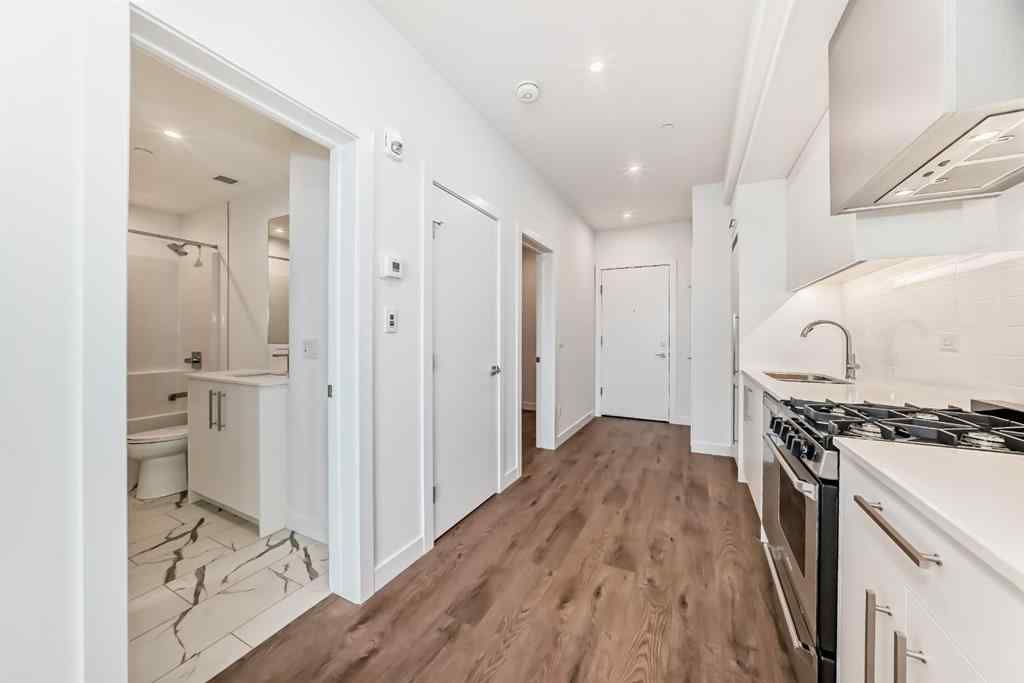 MLS® A2233786 - Unit #411 8230 Broadcast Avenue SW in West Springs Calgary, Residential