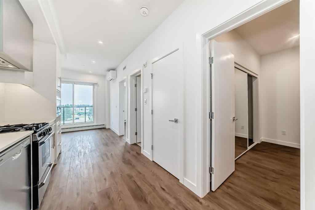 MLS® A2233786 - Unit #411 8230 Broadcast Avenue SW in West Springs Calgary, Residential
