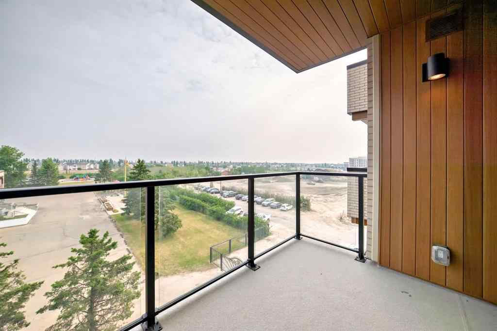 MLS® A2233786 - Unit #411 8230 Broadcast Avenue SW in West Springs Calgary, Residential