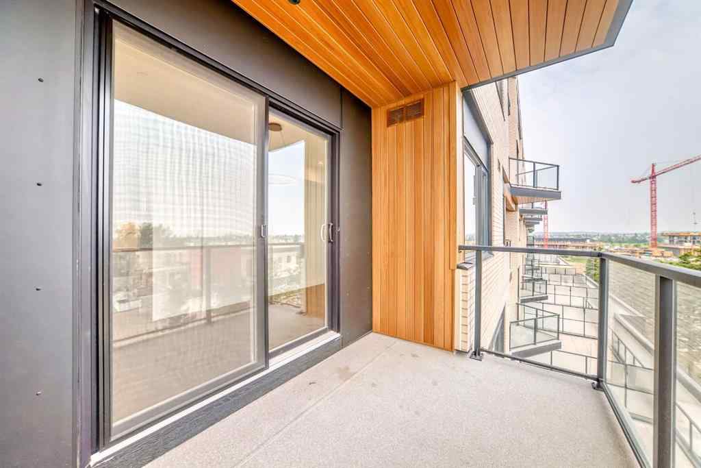 MLS® A2233786 - Unit #411 8230 Broadcast Avenue SW in West Springs Calgary, Residential