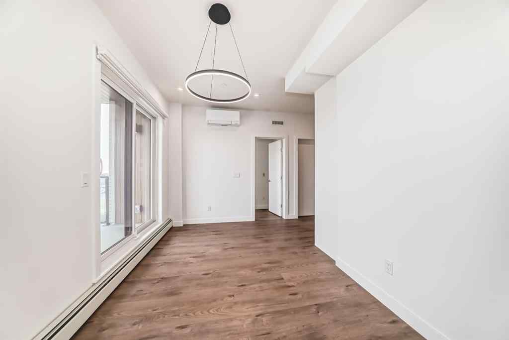 MLS® A2233786 - Unit #411 8230 Broadcast Avenue SW in West Springs Calgary, Residential