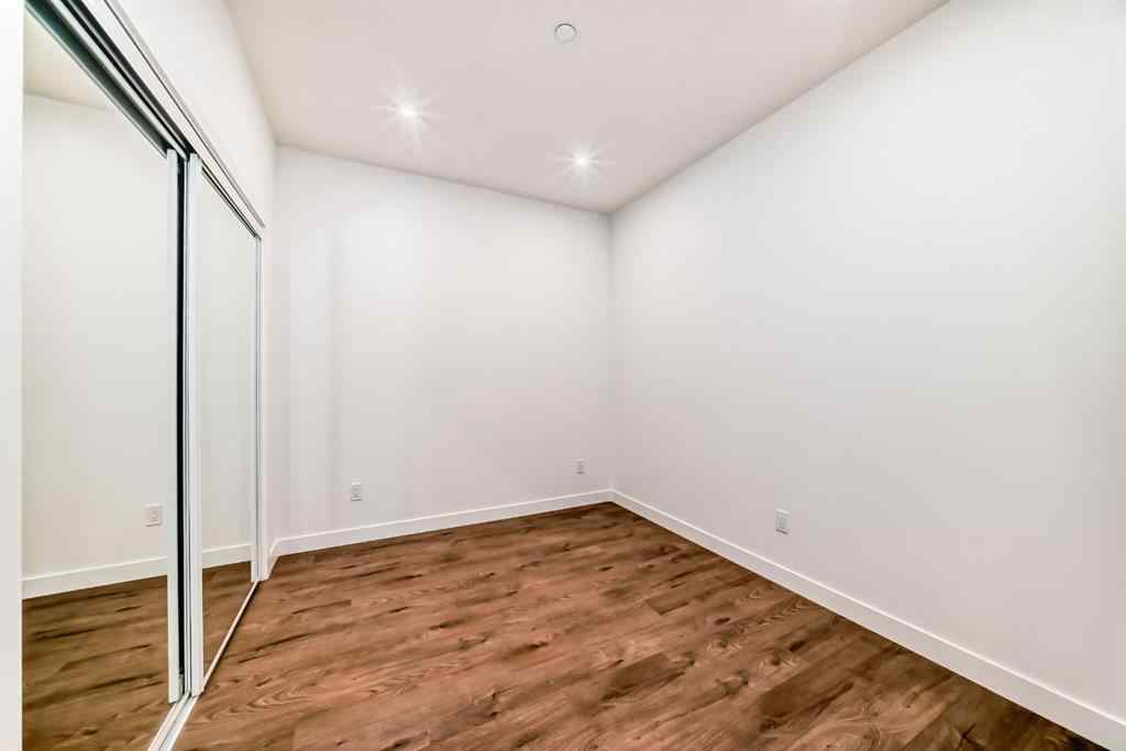 MLS® A2233786 - Unit #411 8230 Broadcast Avenue SW in West Springs Calgary, Residential