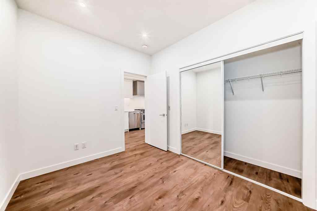 MLS® A2233786 - Unit #411 8230 Broadcast Avenue SW in West Springs Calgary, Residential